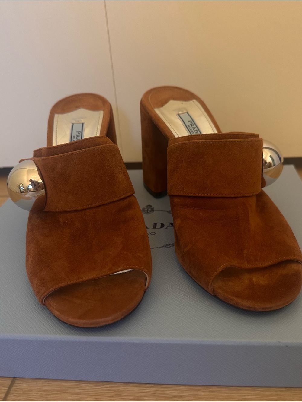 Prada Chestnut Suede Block Heel Mules with Silver Orb Detail